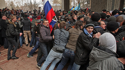 Thousands rally against 'illegitimate govt', raise Russian flags in eastern Ukraine