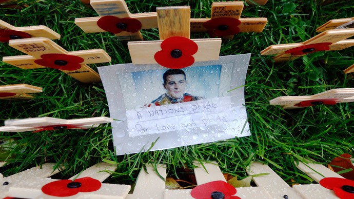 A photograph of Drummer (Private) Lee Rigby of the Royal Regiment of Fusiliers is pictured in the Field of Remembrance at Westminster Abbey in London (Reuters / Luke MacGregor)