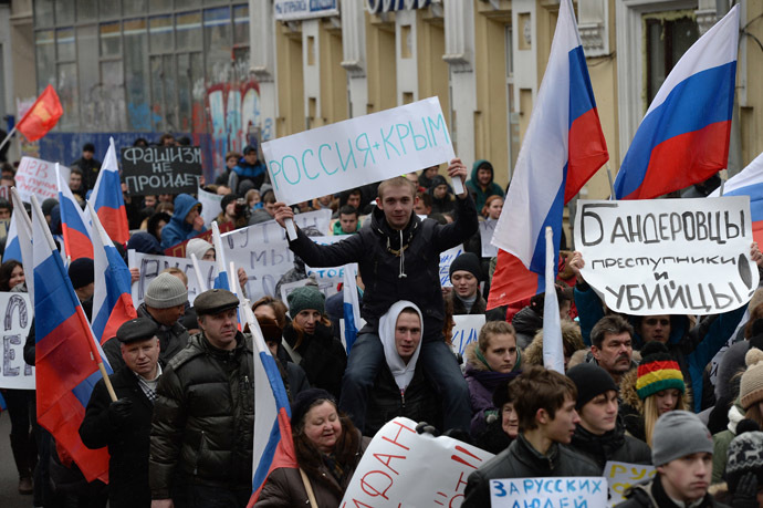 A Moscow rally in support of Russian-speakers in Ukraine. âRussia + Crimea,â âBandera followers are criminals and murderers,â and âFascism wonât pass.â (RIA Novosti/Maksim Blinov)