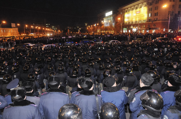Riot police stand guard in front of a regional government building as pro-Russian demonstrators take part in a rally in Kharkov March 5, 2014. (Reuters)