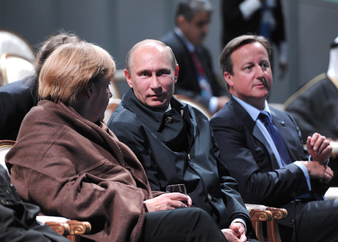 German Chancellor Angela Merkel, Russia's President Vladimir Putin and Britain's Prime Minister David Cameron (L-R) sit to watch a fragment of the ballet "Ruslan and Lyudmila" during the G20 Summit in Peterhof near St. Petersburg September 6, 2013.(Reuters / Michael Klimentyev)