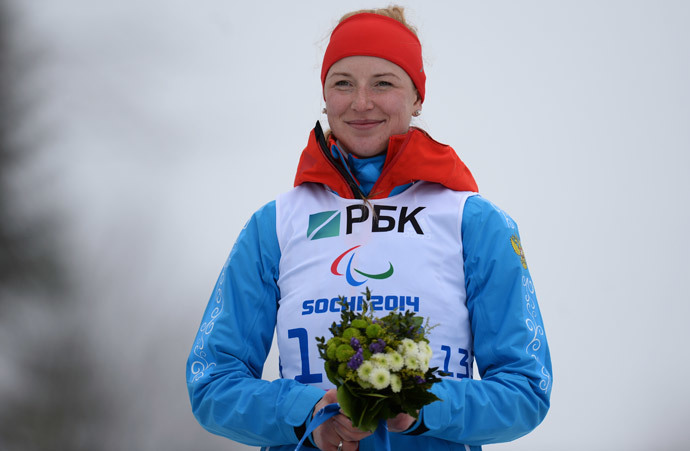 Russiaâs Alena Kaufman after winning gold in the womenâs 10 kilometers standing event at the Sochi Paralympics. (RIA Novosti / Maxim Bogodvid)
