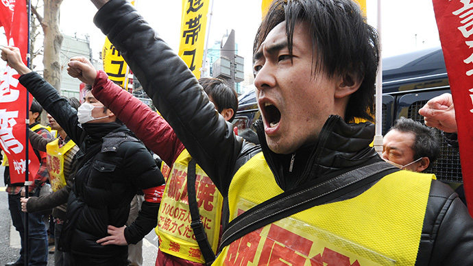 Fukushima nuclear workers stage low pay protest against Tepco