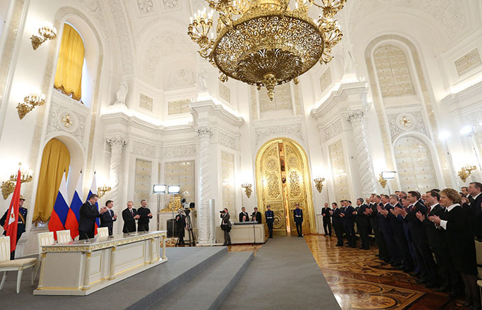 President Vladimir Putin (third left) attending the Kremlin ceremony on signing the Russian Federation-Crimea Treaty on Crimea's integration with Russia and formation of new jurisdictions in the Russian Federation, March 18, 2014. (RIA Novosti / Ekaterina Shtukina)
