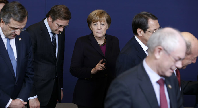 L-R) Greece's Prime Minister Antonis Samaras, Portugal's Prime Minister Pedro Passos Coelho, Germany's Chancellor Angela Merkel and European Council President Herman Van Rompuy take part in a family photo at a European Union leaders summit in Brussels March 20, 2014. (Reuters/Yves Herman)