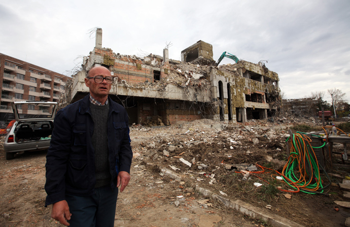 A worker walks in front of the remains of the former Chinese embassy during its demolition in Belgrade November 10, 2010. During the NATO offensive against Yugoslavia, U.S. warplanes bombed the Chinese embassy in Belgrade on May 7, 1999, killing three Chinese nationals, and consequently igniting protests outside the U.S. embassy in Beijing (Reuters)