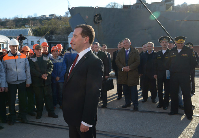 Russia's Prime Minister Dmitry Medvedev (C) visits the 13th Ship-Repairing Yard of Russian Black Sea Fleet in Sevastopol, on March 31, 2014.(AFP Photo / Alexander Astafyev)