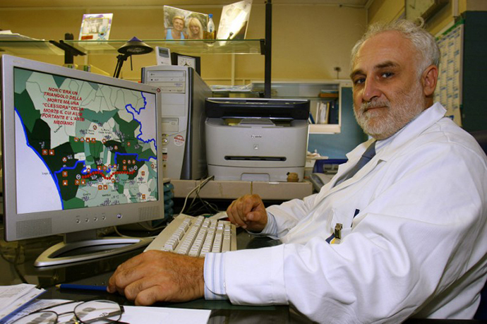 Dr Antonio Marfella, hospital oncologist, shows the "Triangle of Death" on his computer in Naples (AFP Photo / Carlo Hermann)