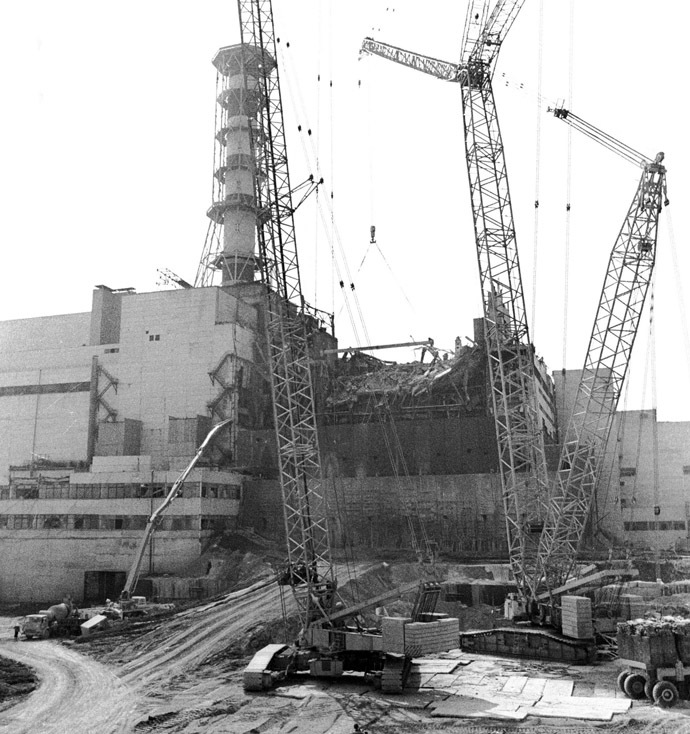 The building of the sarcophagus around the fourth reactor of the Chernobyl nuclear power plant after its explosion is seen in this 1986 file photo. (Reuters)