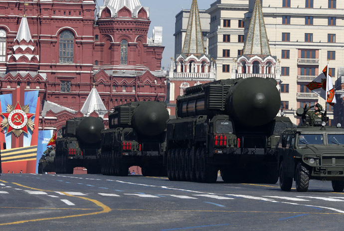 Russian mobile Topol-M missile launching units drive in formation during the Victory Day parade in Moscow's Red Square May 9, 2014. (Reuters)