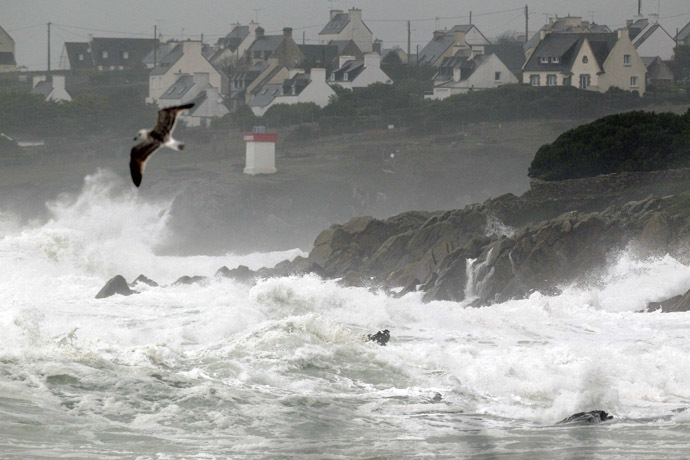 The sea batters the Brittany coastline near Plouhinec in Finistere as an Atlantic storm hits western France, January 1, 2014. (Reuters/Mal Langsdon)