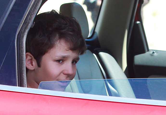 Felipe Juan Froilan, the 13-year-old son of the Spanish king's eldest daughter Infanta Elena, leaves a hospital after being discharged, in Madrid April 16, 2012 (Reuters / Stringer)