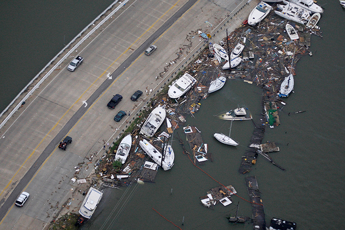 Boats are washed up next to a road after Hurricane Ike hit Clear Lake in Texas September 13, 2008 (Reuters / David J. Phillip)