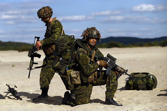 Troops from Canada's 3rd Division, composed with a platoon of 3rd Battalion and Princess Patricia's Light Infantry, participate at a NATO-led exercise "Orzel Alert" held together with the U.S. Army's 173rd Infantry Brigade Combat Team and Poland's 6th Airborne Brigade in Bledowska Desert in Chechlo, near Olkusz, south Poland (Reuters / Kacper Pempel)