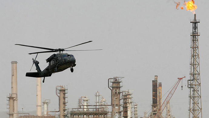 ARCHIVE PHOTO: A U.S. helicopter lands at the oil refinery in Baiji, 180 km (112 miles) north of Baghdad February 25, 2009 (Reuters / Sabah al-Bazee)