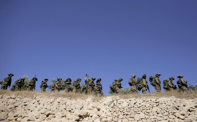 Israeli soldiers take part in an operation to locate three Israeli teens near the West Bank City of Hebron June 17, 2014. (Reuters/Ammar Awad)