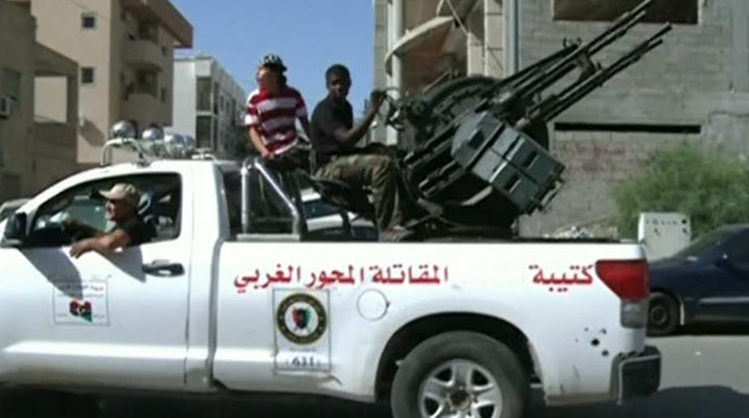 Armed militants and gangsters in the streets of Libya (RT video screenshot)