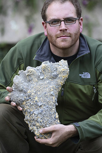 American television channel host Josh Gates displays what is believed to be 'Yeti' footprints to the media in Kathmandu November 30, 2007. (Reuters / Gopal Chitrakar)