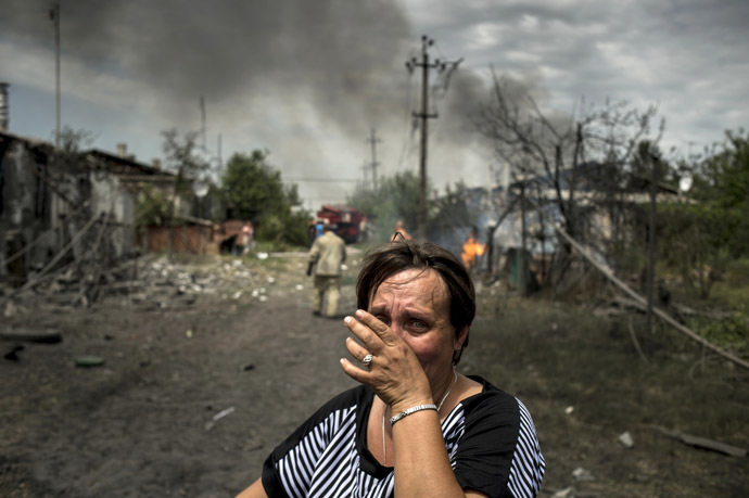 A local resident in the village of Luganskaya after the Ukrainian armed forces' air attack. (RIA Novosti/Valeriy Melnikov)