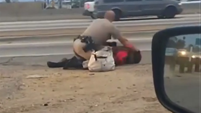 California Highway Patrol 'to investigate' officer's brutal roadside beating of woman (VIDEO)