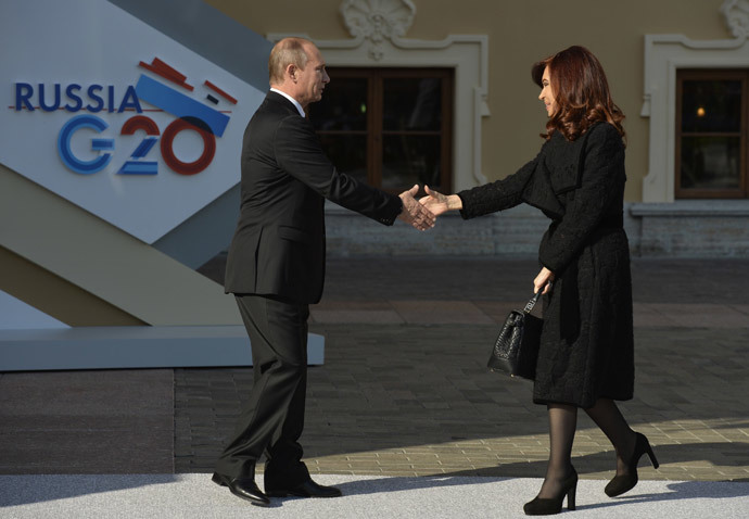 Russiaâs President Vladimir Putin (L) welcomes Argentinaâs President Cristina Fernandez de Kirchner at the start of the G20 summit on September 5, 2013 in Saint Petersburg.(AFP Photo / Eric Feferberg)