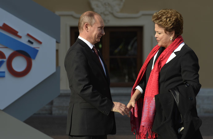 Russiaâs President Vladimir Putin (L) welcomes Brazilâs President Dilma Rousseff at the start of the G20 summit on September 5, 2013 in Saint Petersburg.(AFP Photo / Eric Feferberg)