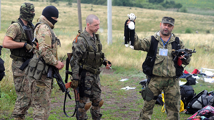 Perverted truth: How rebel mourning MH17 victims was turned into looter with trophy
