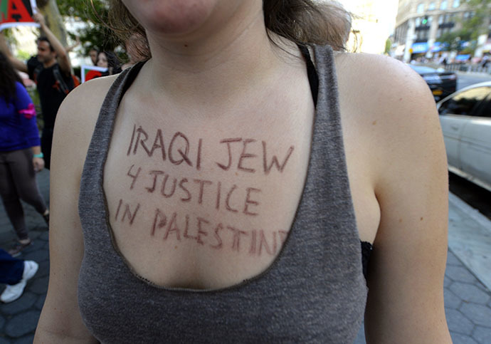 New Yorkers gather to protest IsraelÃ­s military assault in Gaza during a rally at Foley Square July 24, 2014 where they will read aloud over hundred names of the Palestinian children that killed in IsraelÃ­s assault, before march through lower Manhattan. (AFP Photo / Timothy A. Clary)