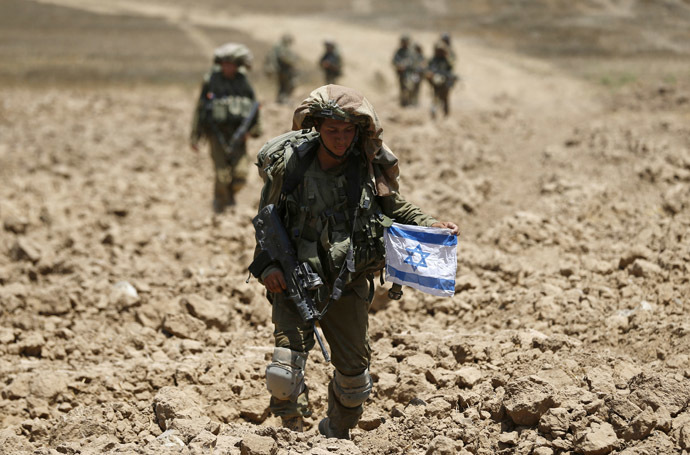Israeli soldiers from the Givati brigade return to Israel from Gaza August 3, 2014. (Reuters/Baz Ratner)
