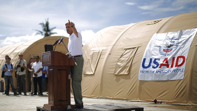 U.S. Secretary of State John Kerry delivers remarks during a tour of the damage from super typhoon Haiyan in Tacloban December 18, 2013. (Reuters)
