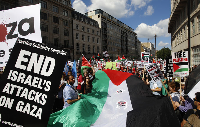 Demonstrators march to support the people of Gaza, in central London August 9, 2014. (Reuters/Luke MacGregor)