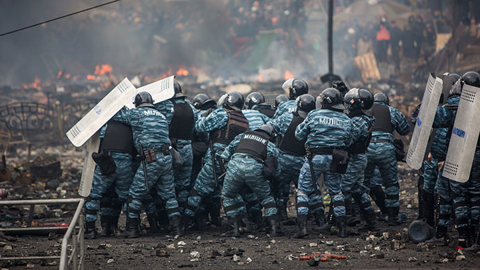 Police officers are seen on Maidan Nezalezhnosti square in Kiev, where clashes began between protesters and the police on February 19, 2014. (RIA Novosti / Andrey Stenin)