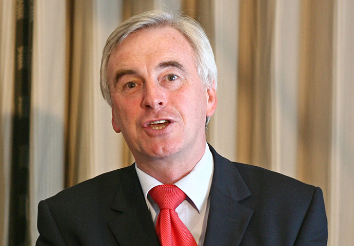 The UK government has, in all likelihood, presided over the export of arms to Israel used to âslaughter innocent civilians on the Gaza Stripâ, Labour MP John McDonnell warns. (AFP Photo / Chris Young)