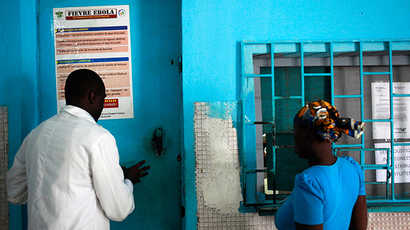 Police open fire, use tear gas on crowds as Liberia struggles to contain deadly Ebola