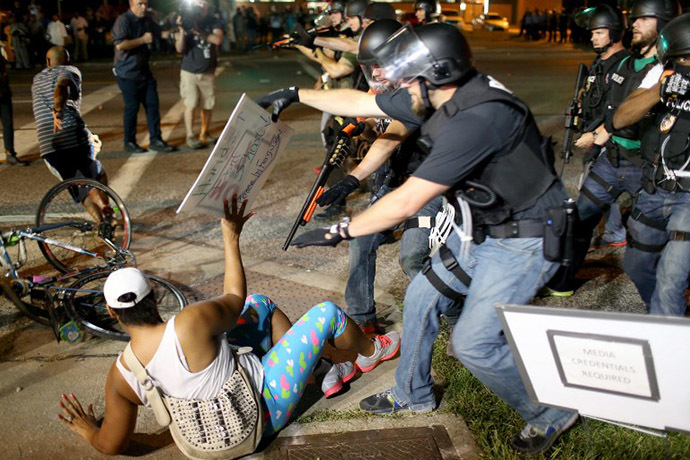 Police officers arrest a demonstrator on August 18, 2014 in Ferguson, Missouri. (AFP Photo / Getty Images / Joe Raedle)