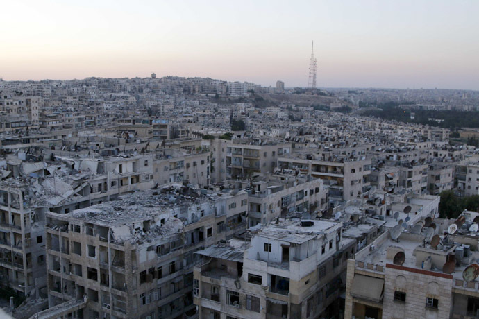 A general view shows damaged buildings in Aleppo's al-Ansari neighbourhood June 14, 2014. Picture taken June 14. (Reuters/Hosam Katan)