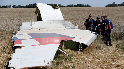 MH17 broke up in mid-air due to external damage - Dutch preliminary report