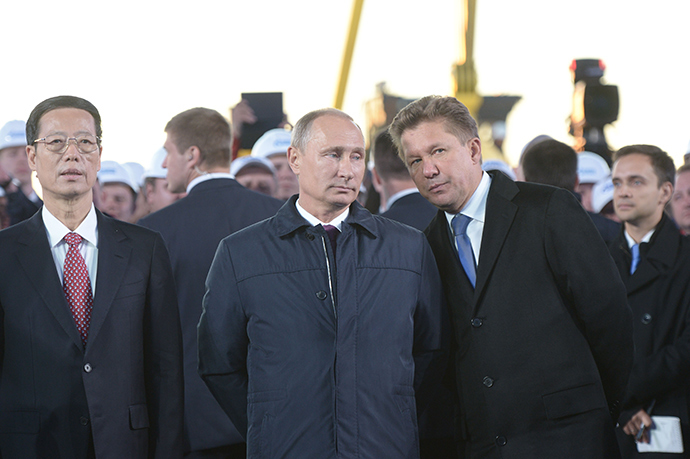 September 1, 2014. Russian President Vladimir Putin, right, at the ceremony marking the joining of the first link in the Power of Siberia main gas pipeline, held at Namsky Highway near Us Khatyn village. Gazprom Board Chairman Alexei Miller, right. Vice Premier of the People's Republic of China Zhang Gaoli, left (RIA Novosti / Alexey Nikolsky)