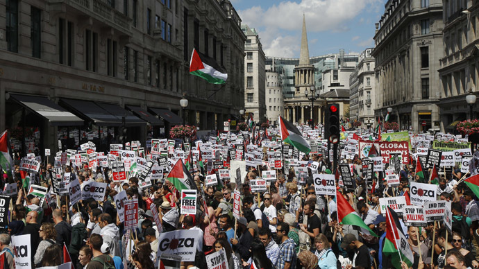 Demonstrators join a rally to support the people of Gaza, in central London, August 9, 2014. (Reuters / Luke MacGregor)