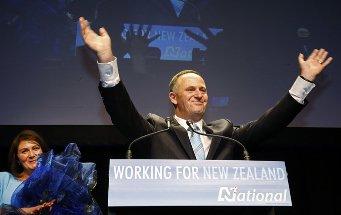 New Zealand's National Party leader and Prime Minister-elect John Key celebrates a landslide victory as his wife Bronagh (L) applauds at the National election party during New Zealand's general election in Auckland, September 20, 2014. (Reuters/Nigel Marple)