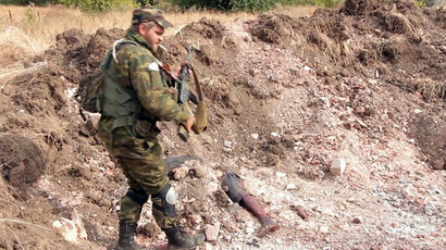 Strong proof Right Sector, National Guard linked to mass graves near Donetsk – Moscow