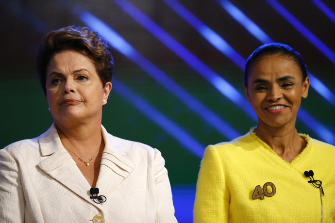 Brazil's presidential candidates Dilma Rousseff (L) of Workers Party (PT) and Marina Silva of Brazilian Socialist Party (PSB) take part in a TV debate in Rio de Janeiro October 2, 2014. (Reuters/Ricardo Moraes)