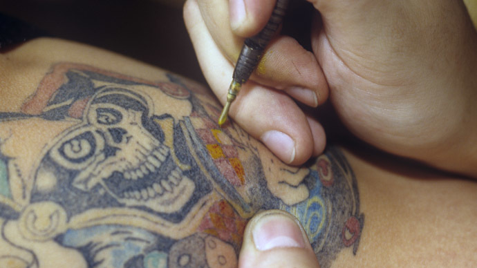 The girl with the hazard tattoo:  Duma scrutinizes ‘tramp stamp’ dangers