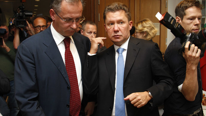 Gazprom CEO Alexey Miller (C) leaves after talks on energy security between EU-Commissioner for Energy, Russian Energy Minister and Ukrainian Energy Minister on September 26, 2014 in Berlin.(AFP Photo / Odd Andersen)