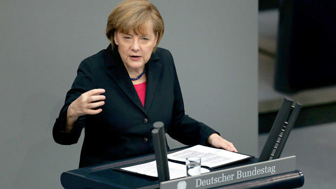 German Chancellor Angela Merkel delivers a speech during a debate on the 2014 federal budget at the lower house of parliament Bundestag on April 9, 2014, in Berlin. (AFP Photo / Ronny Hartmann