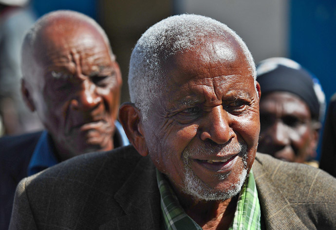 Githu wa-Kahengeri, a spokesman for the Mau Mau War Veterans Association smiles on October 5, 2012. (AFP Photo/Tony Karumba)