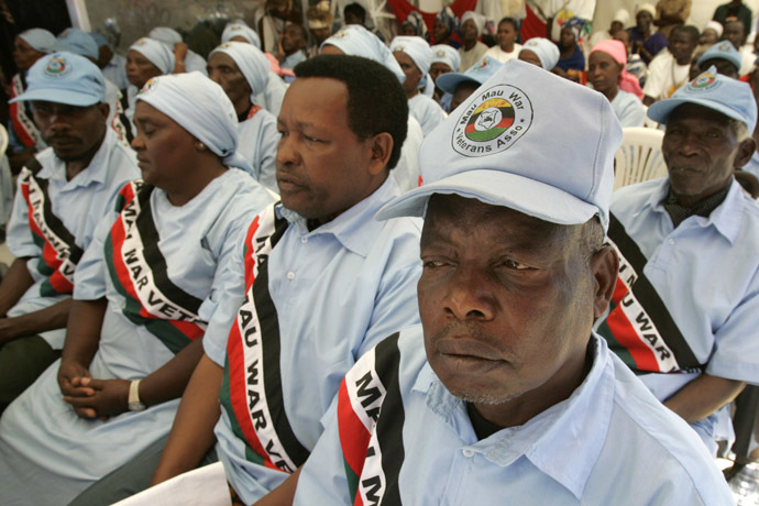 Members of the Kenya Mau Mau freedom fighters association gather to witness the official unveiling of a bronze statue monument of their hero Dedan Kimathi in Nairobi February 18, 2007. (Reuters/Antony Njuguna)