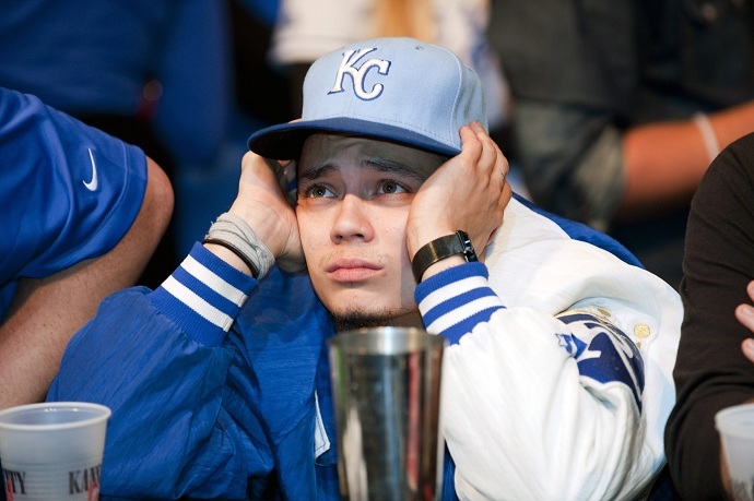 A Kansas City Royals fan reacts to the team's loss at baseball's World Series against the San Francisco Giants (Reuters/Sait Serkan Gurbuz)