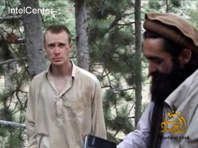 This still image provided on December 7, 2010 by IntelCenter shows the Taliban associated video production group Manba al-Jihad December 7, 2010 release of someone that appears to be US soldier Bowe Bergdahl (L), who has been held hostage by the Taliban since his disappearance from his unit on June 30, 2009. (AFP/IntelCenter)