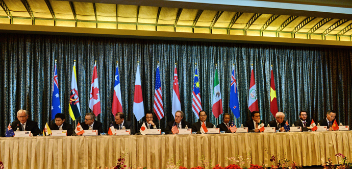 Trade ministers and representatives attend a press conference at the Trans-Pacific Partnership (TPP) ministerial meeting in Singapore on February 25, 2014. (AFP Photo / Roslan Raman)